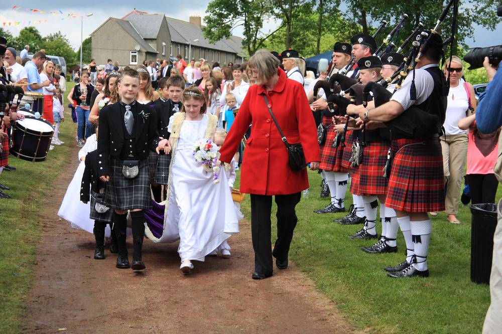 Queen Shonagh and her court on their way to the crowning